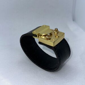 Leather bracelet, gold-tone hook and lock closure